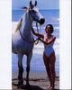 Tahnee Welch on the beach with a horse photo print.