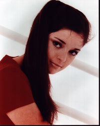 Angela Cartwright looking over shoulder in red top photo print