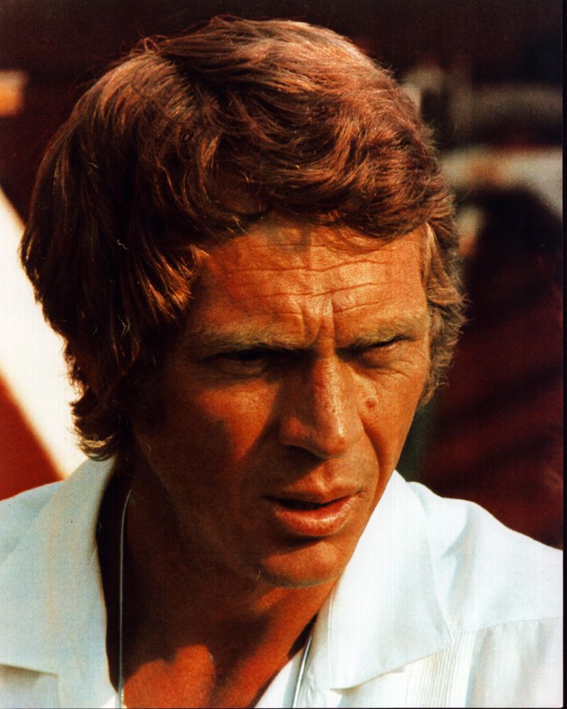 Close-up photo print of Steve McQueen in white top