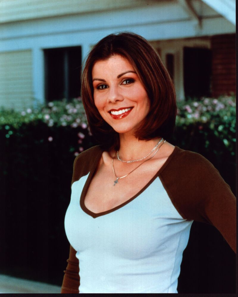 Heather Dubrow stylish photo print in brown and white top