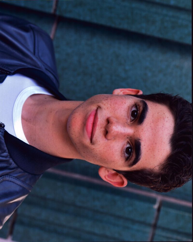 Cameron Boyce close-up photo print in leather jacket.