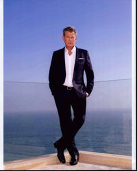 David Foster On Glass Balcony Photo Print - 8x10