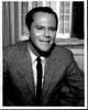 Black and white photo print of Dick Sargent in a suit and tie.