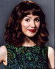 Noël Wells headshot photo print in green patterned shirt