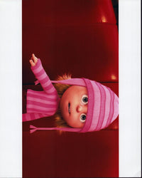Edith pointing photo print from Despicable Me featuring Dana Gaier.