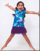 Carmina Garay Jumping In Purple Skirt Photo Print showcasing a dancer in mid-jump with a flowing purple skirt.