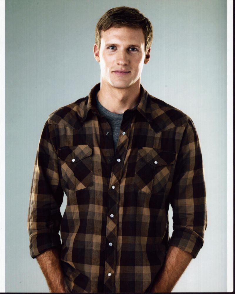 Teddy Sears photo print in brown plaid shirt.