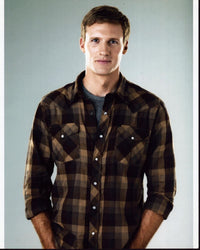 Teddy Sears photo print in brown plaid shirt.