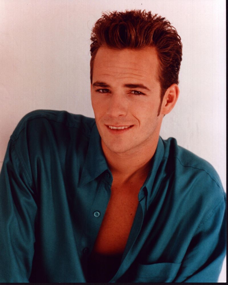 Luke Perry in aqua top photo print, perfect for fans and collectors.