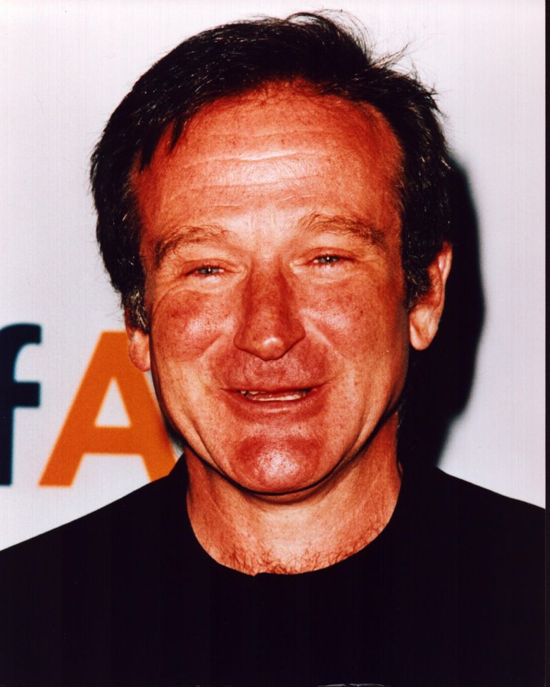 Close-up smiling photo print of Robin Williams, capturing his joyful spirit.