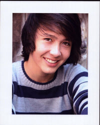 Sam Tan in Striped Sweater Photo Print - Stylish decor for home or office.