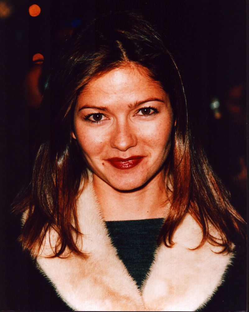 Jill Hennessy photo print in fur trimmed jacket, elegant and stylish.