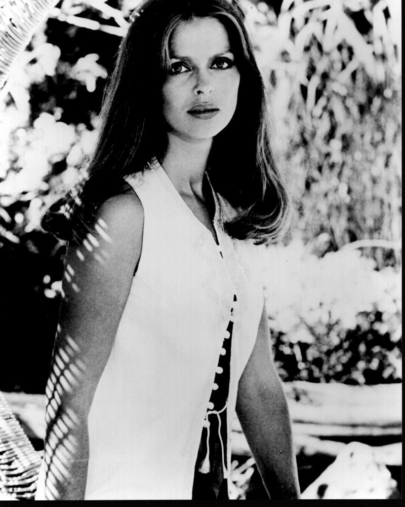 Barbara Bach black and white photo print in white vest