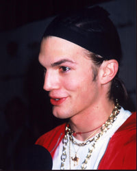 Ashton Kutcher photo print in chains and red jacket, vibrant and stylish.
