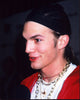 Ashton Kutcher photo print in chains and red jacket, vibrant and stylish.