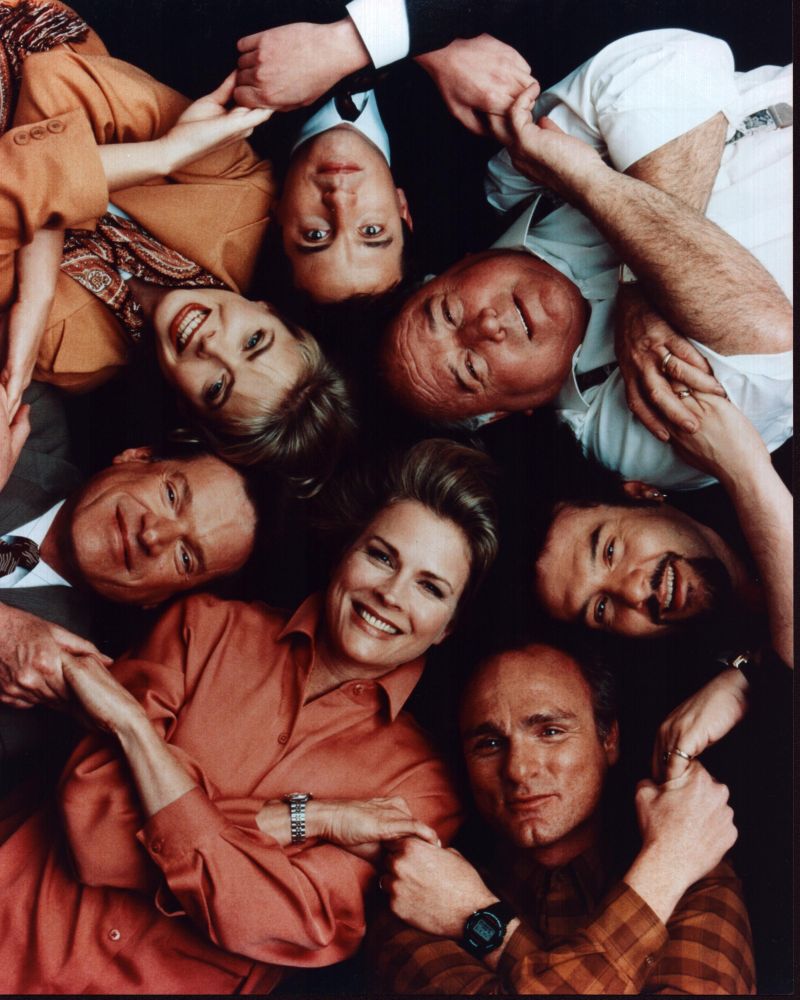 Murphy Brown Group Holding Hands Photo Print showcasing iconic characters.