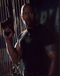 Dwayne Johnson holding a gun in G.I. Joe: Retaliation photo print.