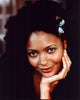 Thandiwe Newton headshot photo print featuring her with her head on her hand.