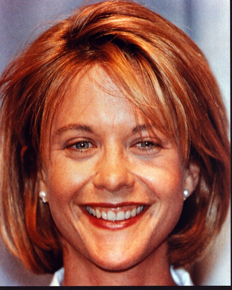 Meg Ryan close-up smiling photo print showcasing her iconic expression.
