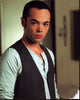 John Hensley headshot photo print in brown vest
