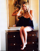 Kaley Cuoco Sitting on Dresser Photo Print - Premium Quality