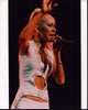 Christina Aguilera singing with hand raised photo print