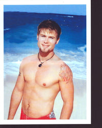 Jacob Young on beach in swimsuit photo print