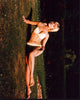 Yutte Stensgaard lounging on grass in bikini photo print