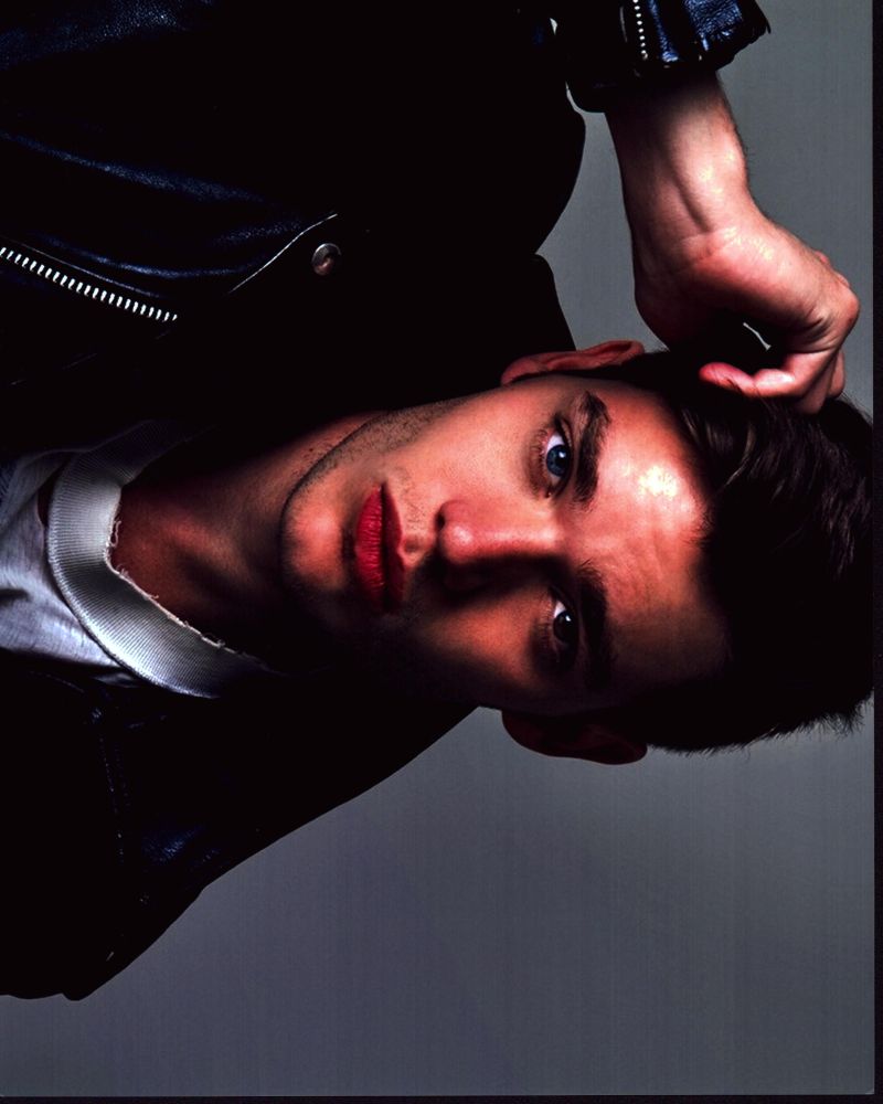 Dominic Sherwood photo print in leather jacket with hand up