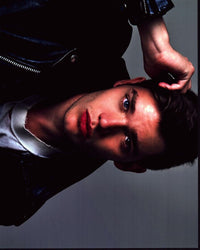 Dominic Sherwood photo print in leather jacket with hand up