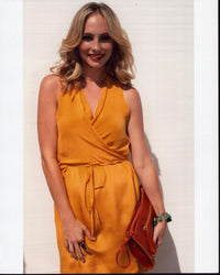Candice Accola photo print in a yellow wrap dress, stylish and vibrant.