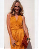 Candice Accola photo print in a yellow wrap dress, stylish and vibrant.