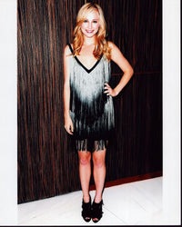 Candice Accola in fringe dress photo print, stylish and vibrant.
