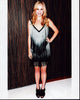 Candice Accola in fringe dress photo print, stylish and vibrant.