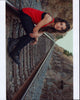 Bianca Mihailov Sitting on Railroad Tracks Photo Print