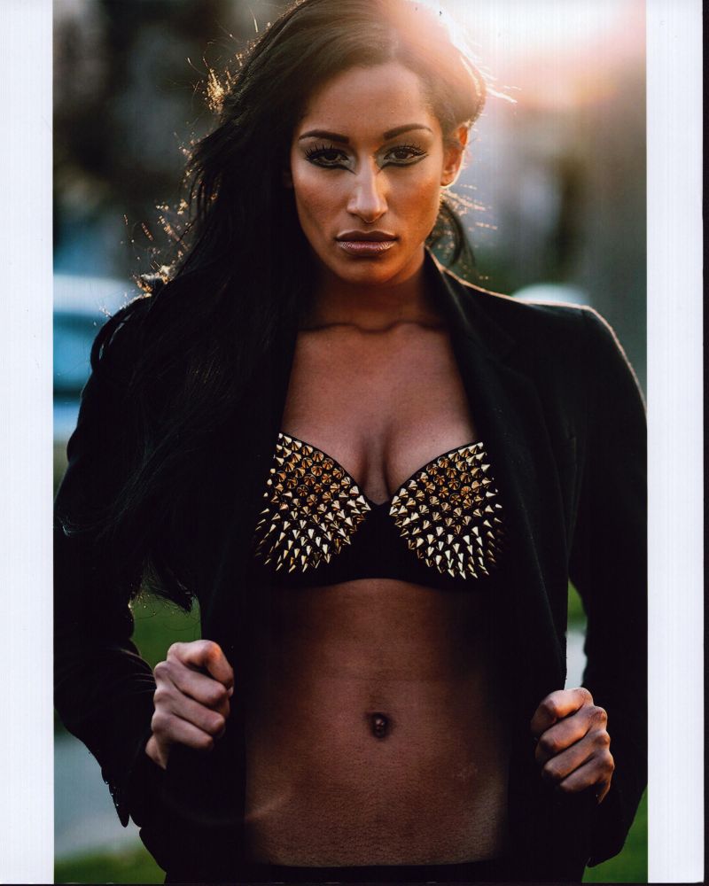 Kiara Belan photo print in studded bra and jacket, available in various sizes.
