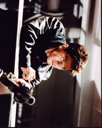 Mark Wahlberg leaning on railing in The Corruptor photo print.