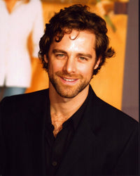 David Sutcliffe photo print in black shirt and blazer.