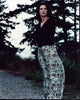 Sandra Bullock in Practical Magic wearing a sweater and floral skirt - photo print.