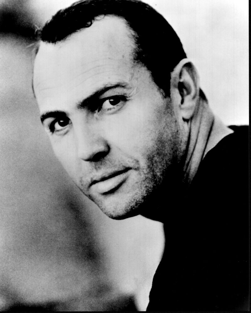 Black and white headshot photo print of Arnold Vosloo
