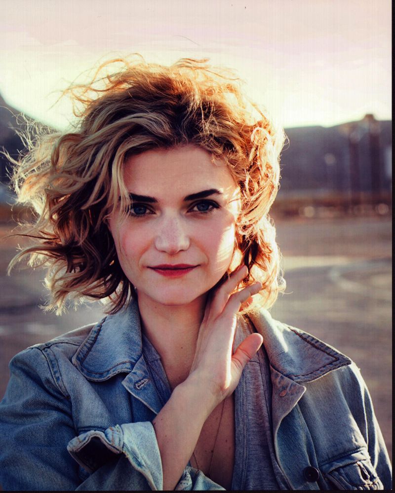 Megan Ferguson in denim jacket photo print showcasing stylish fashion.