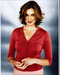Brenda Strong in red sweater photo print, vibrant and elegant wall art.