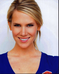 Juliette Jackson headshot photo print in blue top, capturing elegance.