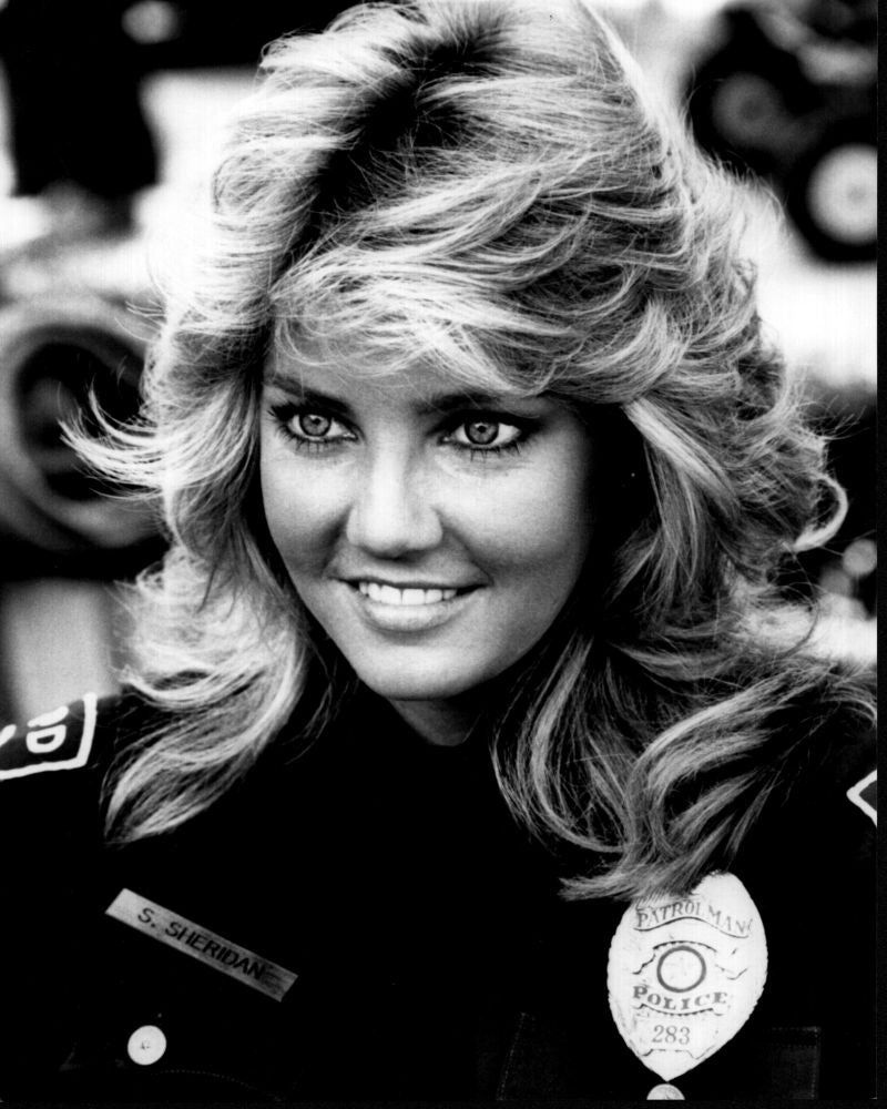 Heather Locklear in uniform from T.J. Hooker black and white photo print.
