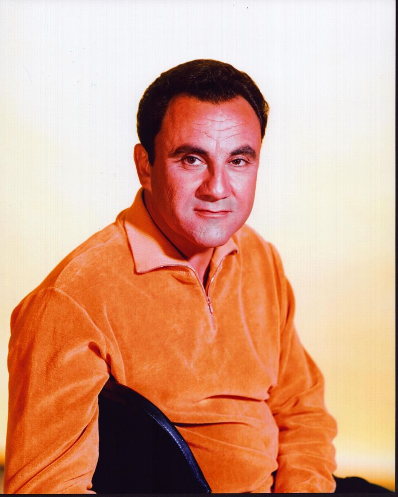 Bill Dana sitting in an orange sweater photo print