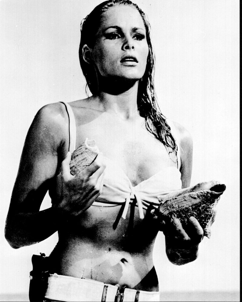 Ursula Andress holding shells in Dr. No black and white photo print.