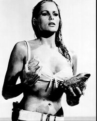 Ursula Andress holding shells in Dr. No black and white photo print.