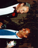 Jack Lemmon and Tony Curtis engaged in conversation at an event photo print.