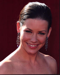 Evangeline Lilly photo print at event in strapless dress.