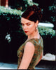 Debi Mazar looking over shoulder in a green dress photo print